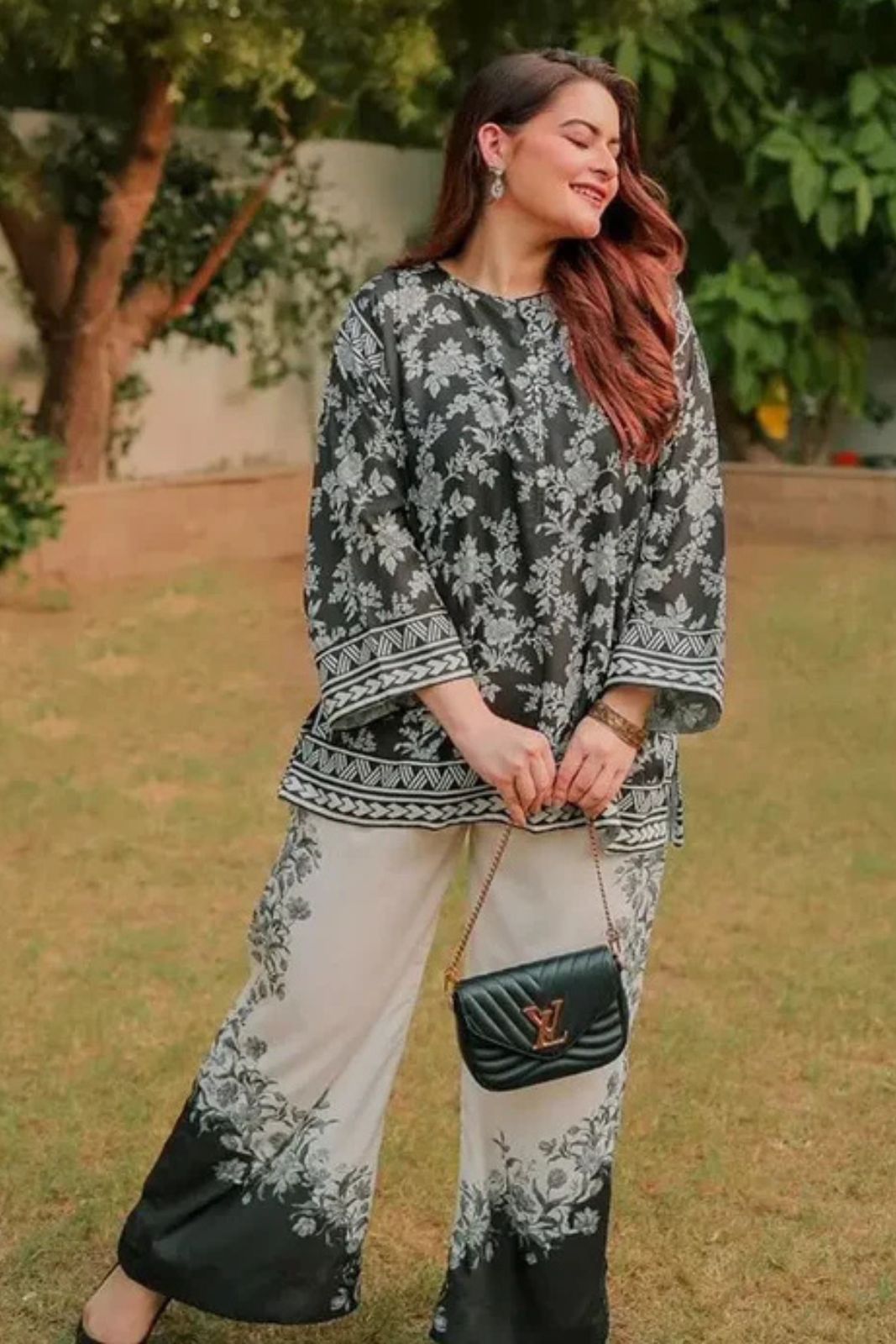 Swiss Lawn Digital Print 2PC stitched suit for women featuring lightweight breathable fabric, vibrant summer prints, and stylish ready-to-wear design – perfect for mid-summer casual and festive wear by Ragini