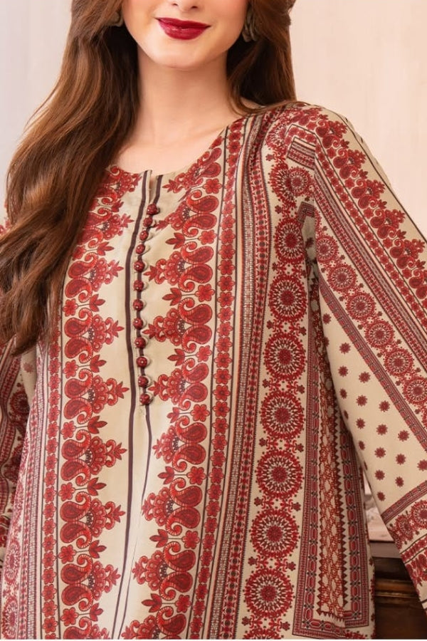 Close-up of a person wearing a red and white embroidered traditional outfit.
