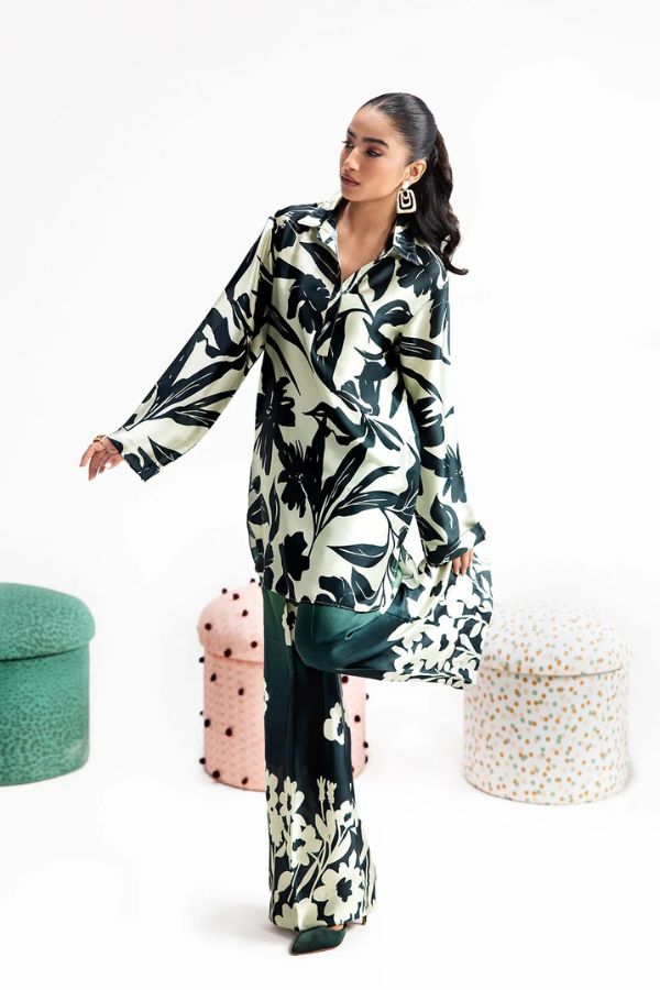 Woman wearing a floral dress with a white background