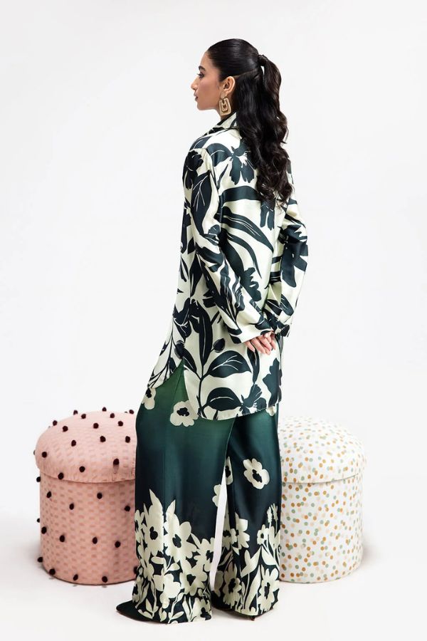 Woman wearing a floral dress with a white background