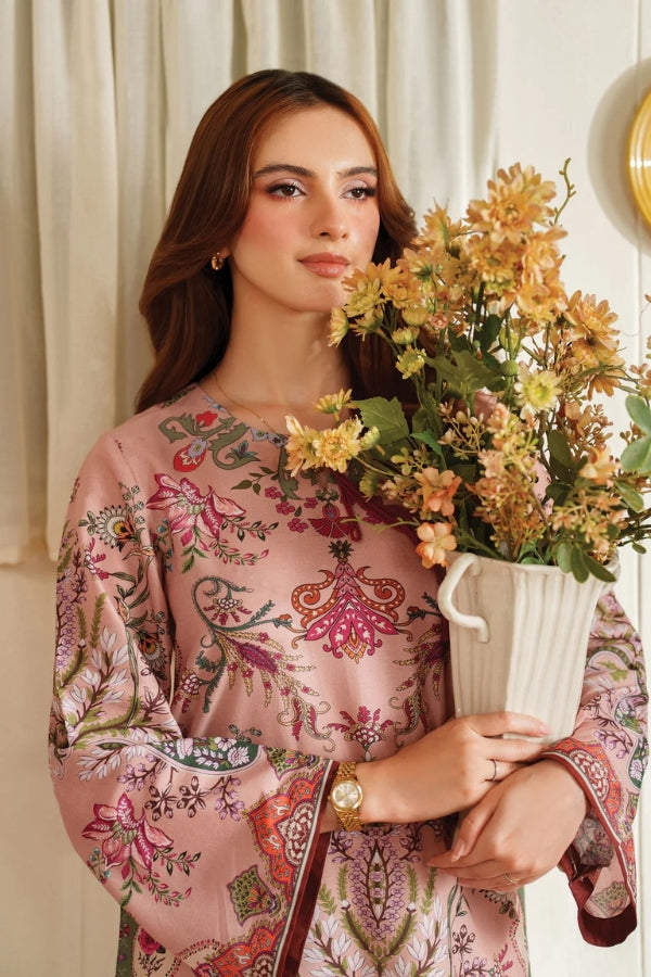 Woman holding a bouquet of flowers indoors