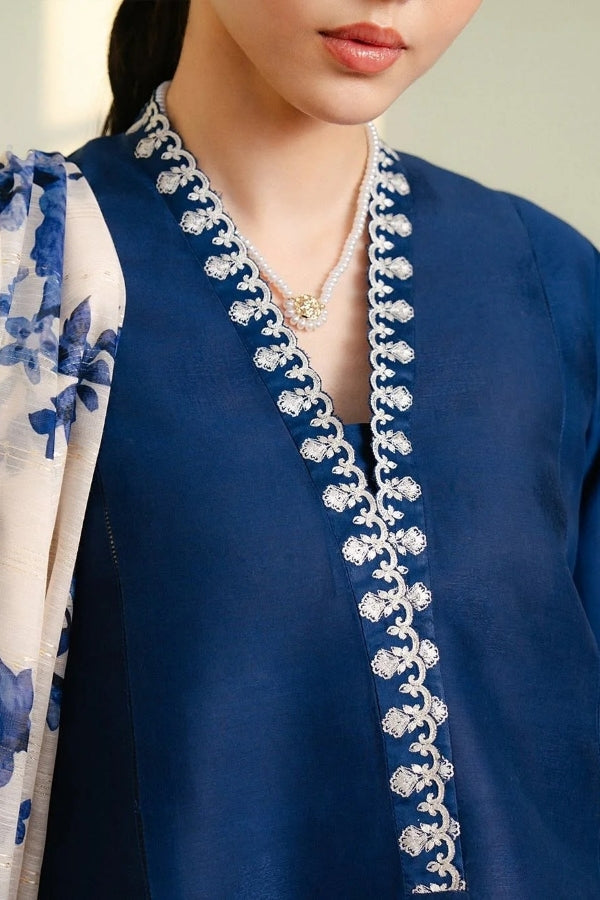 Royal blue Shahnoor 3PC embroidered lawn suit with intricate front embroidery, dyed trouser with embroidered hem, and digitally printed dupatta, displayed elegantly for Eid and festive occasions.
