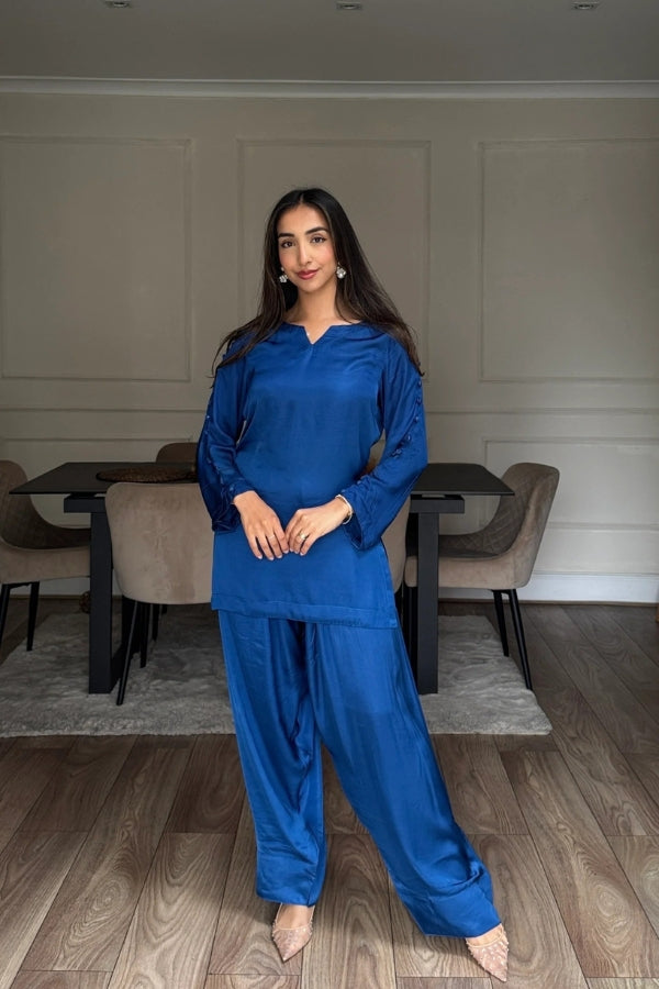 Sapphire Haze 3-piece blue silk suit for women with farshi shalwar, organza dupatta, and button-detailed sleeves – luxury festive wear 2025.