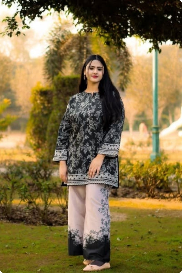 Swiss Lawn Digital Print 2PC stitched suit for women featuring lightweight breathable fabric, vibrant summer prints, and stylish ready-to-wear design – perfect for mid-summer casual and festive wear by Ragini