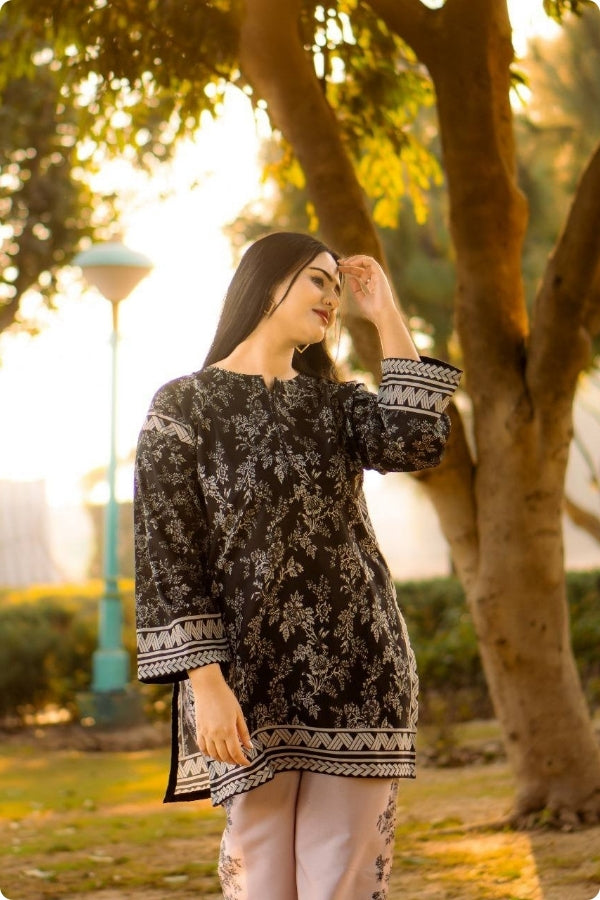 Swiss Lawn Digital Print 2PC stitched suit for women featuring lightweight breathable fabric, vibrant summer prints, and stylish ready-to-wear design – perfect for mid-summer casual and festive wear by Ragini