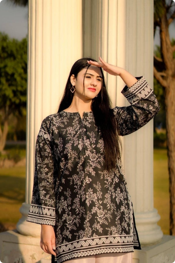 Swiss Lawn Digital Print 2PC stitched suit for women featuring lightweight breathable fabric, vibrant summer prints, and stylish ready-to-wear design – perfect for mid-summer casual and festive wear by Ragini