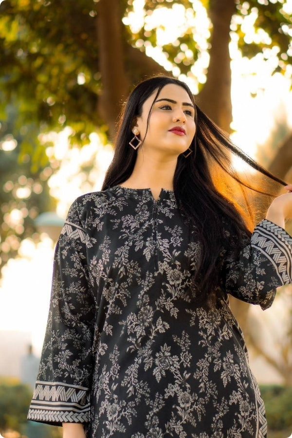 Swiss Lawn Digital Print 2PC stitched suit for women featuring lightweight breathable fabric, vibrant summer prints, and stylish ready-to-wear design – perfect for mid-summer casual and festive wear by Ragini