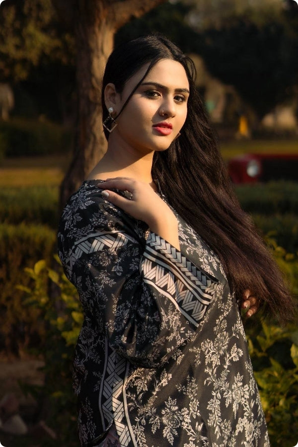 Swiss Lawn Digital Print 2PC stitched suit for women featuring lightweight breathable fabric, vibrant summer prints, and stylish ready-to-wear design – perfect for mid-summer casual and festive wear by Ragini