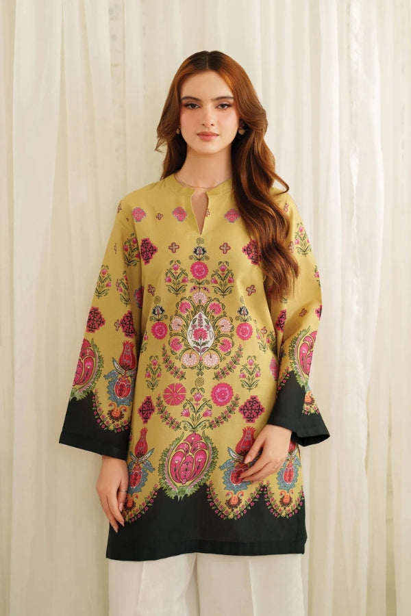 Woman wearing a yellow Printing kurta with a white background
