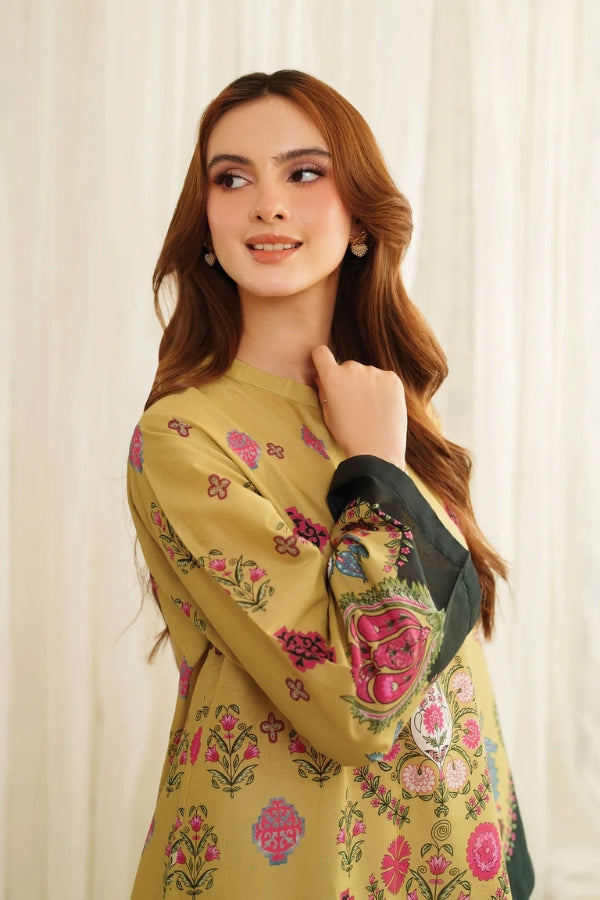 Woman wearing a yellow Printing traditional outfit with a white curtain background